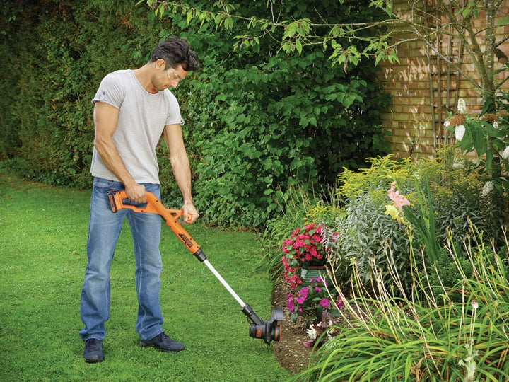 Black+Decker Akku-Rasentrimmer ST182320 (18V 2,0Ah, 25 cm Schnittbreite, AFS Reflex automatische Fad