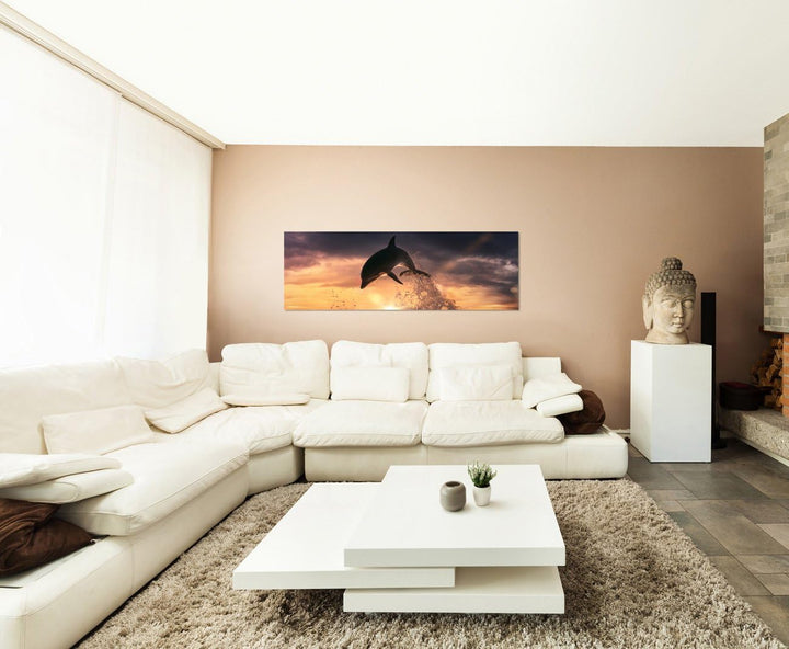 Paul Sinus Art Panoramabild auf Leinwand und Keilrahmen 150x50cm Meer Delfin Sprung Sonnenuntergang