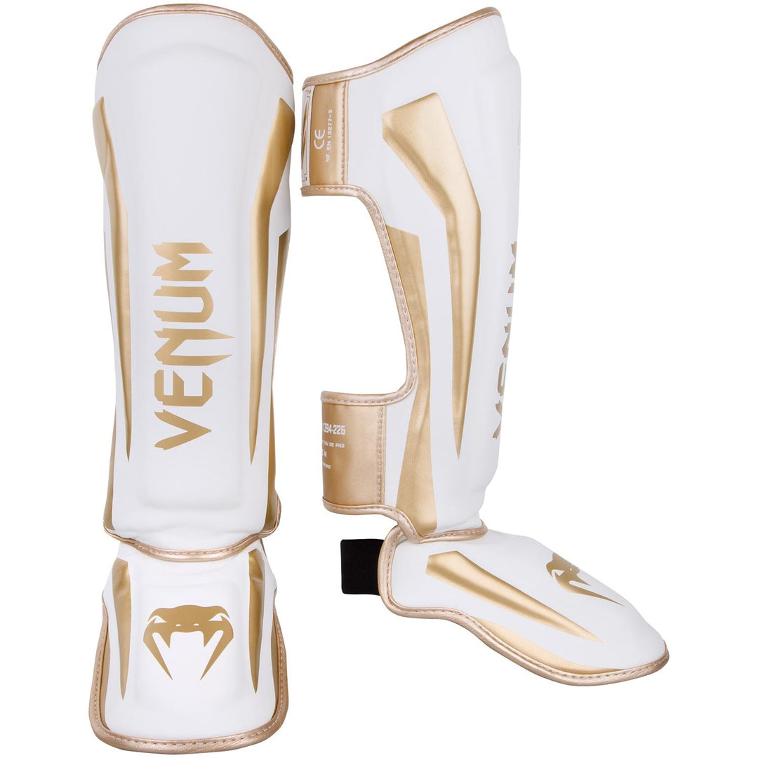 Venum Elite Boxen Schienbeinschutz L Weiss / Gold, L Weiss / Gold