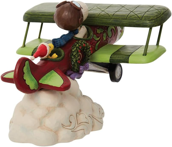 Enesco Jim Shore Peanuts Snoopy Flying Christmas Ace Flugzeug-Figur, 13 cm, mehrfarbig
