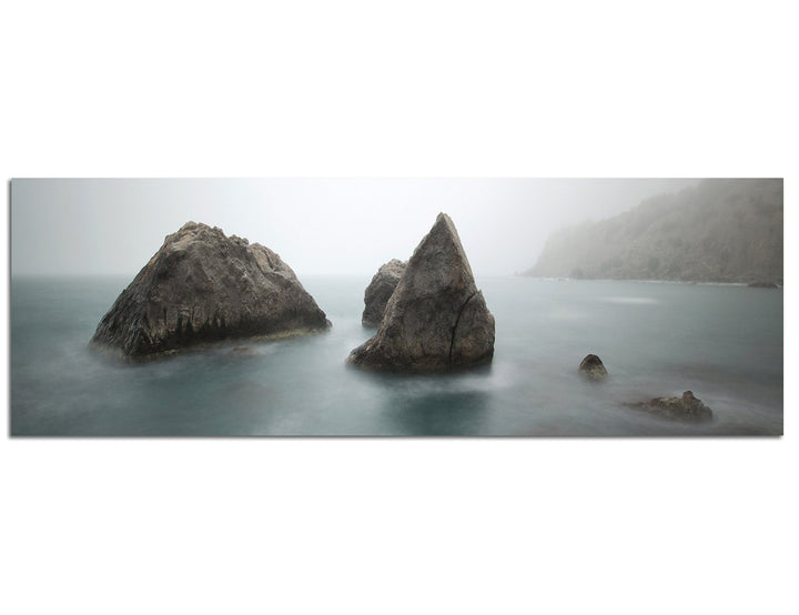 Paul Sinus Art Panoramabild auf Leinwand und Keilrahmen 150x50cm Meer Morgendämmerung Nebel Felsen
