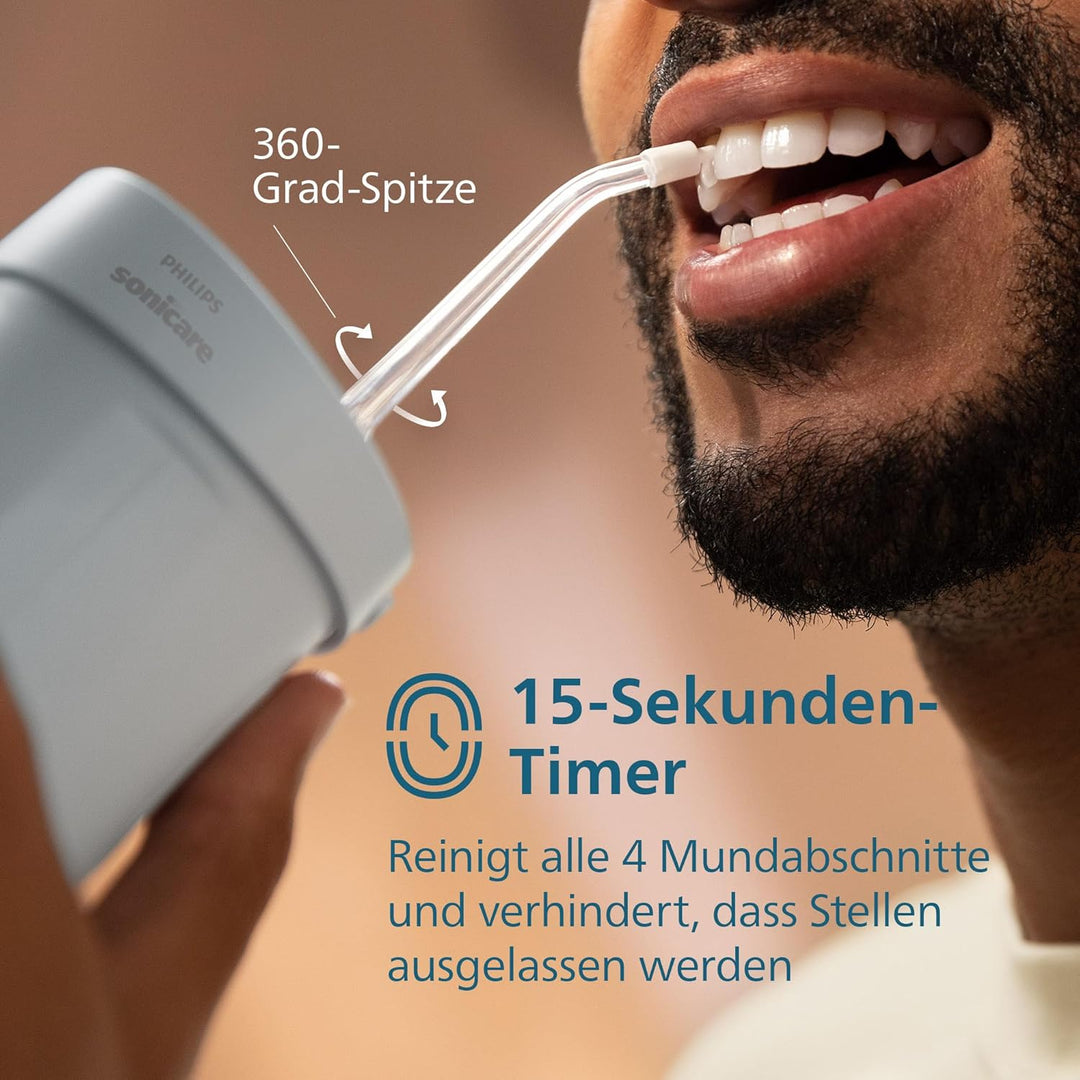 Philips Sonicare Compact Flosser 1000, tragbare Munddusche mit 3 Reinigungsprogrammen, IPX7 wasserdi