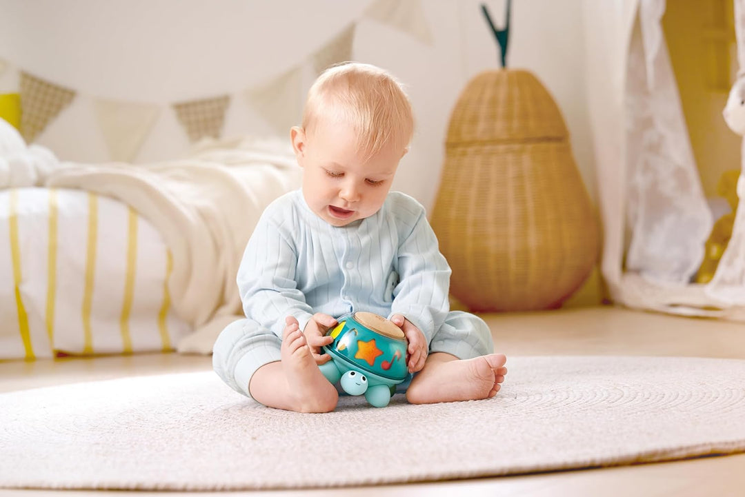 Hape Musik-Schildkröte, Musikalisches Spielzeug ab Geburt, Lernspielzeug mit Sound &amp; Drehfunktion, S