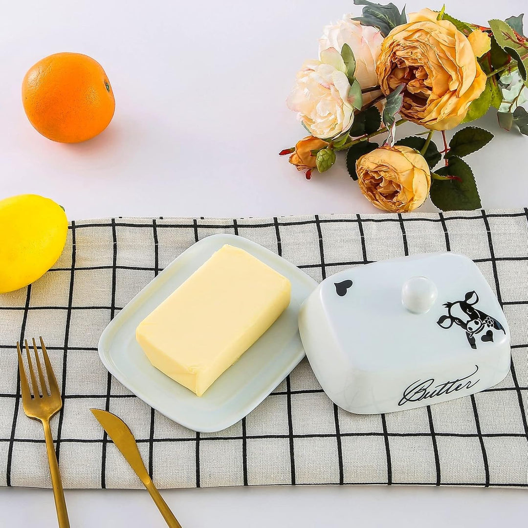 Butterdose mit Griff für 250g Butter, Hochwertige Keramik, Weiss mit Schwarzem Kuhkopfmuster, Porzel