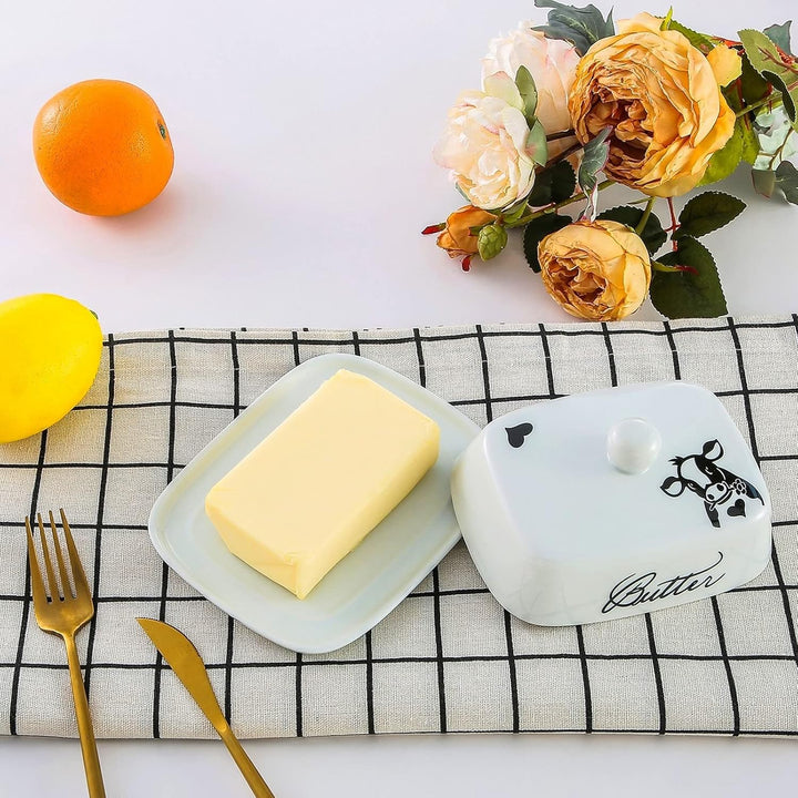 Butterdose mit Griff für 250g Butter, Hochwertige Keramik, Weiss mit Schwarzem Kuhkopfmuster, Porzel