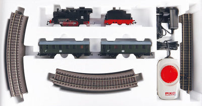 Piko 57112 Start-Set mit Bettung mit Personenzug der DB, Dampflok mit Tender und zwei Personenwagen