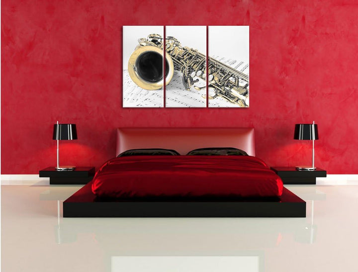 Pixxprint Saxophon auf Notenpapier als Leinwandbild/Grösse: 3 Teilig (120x80 cm) cm/Wandbild/Kunstdr