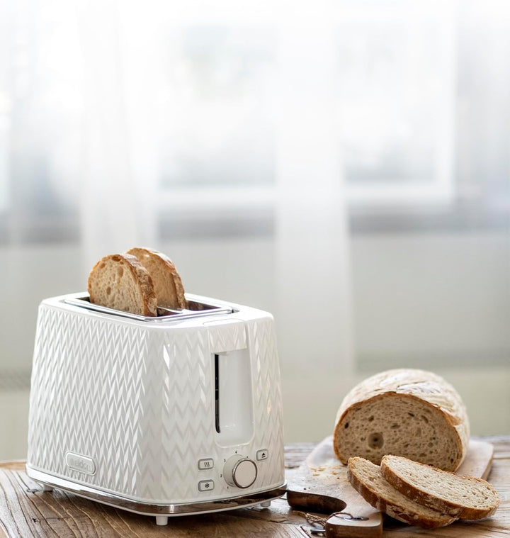 eldom TO265 Nele Toaster | 7 Röststufen | Defrost-Funktion | mit integrierten Brötchenaufsatz | Krüm