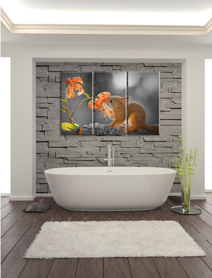 Pixxprint Eichhörnchen riecht an Einer Blume als Leinwandbild/Grösse: 3 Teilig (120x80 cm) cm/Wandbi