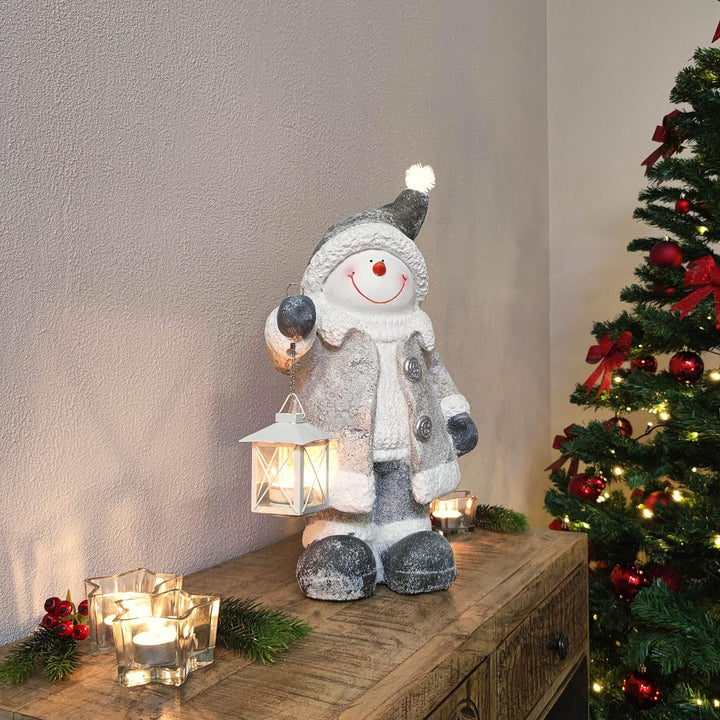 DARO DEKO Winterfigur Schneemann mit LED und Windlicht Laterne 28 x 47cm Dekofigur Weihnachtsdeko Sc