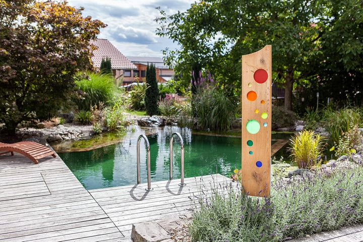 Gartenskulptur aus Holz und Glas. Gartendekoration als Unikate handgefertigt und wetterfest