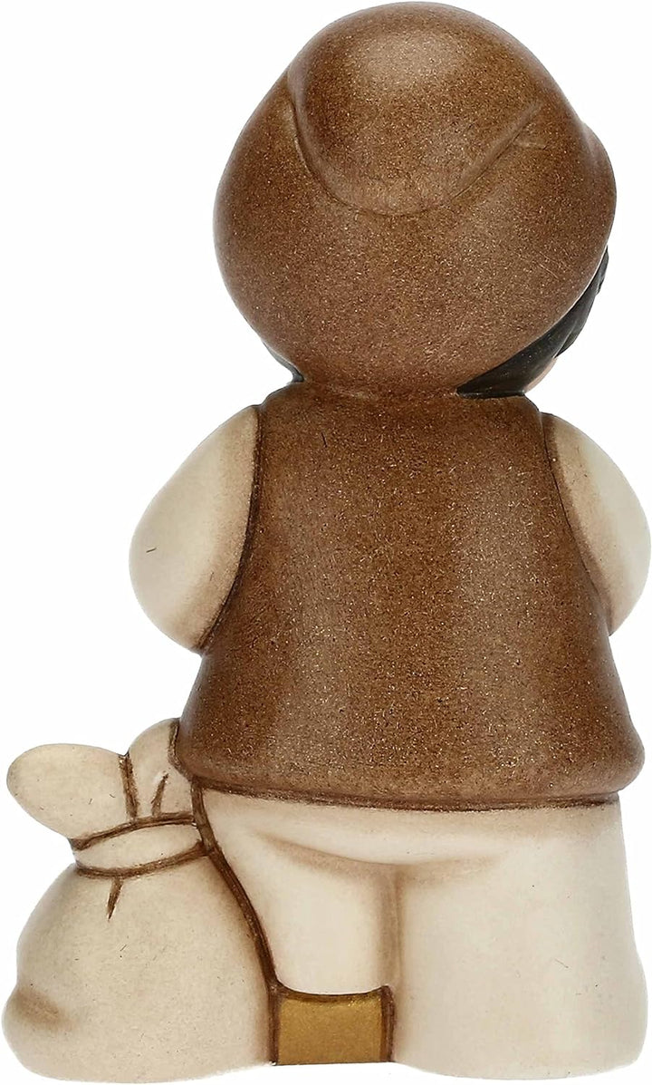 THUN - Kleinkind mit weissem Apfel Krippe