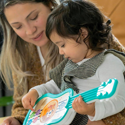 Baby Einstein 12609 Hape Sing & Strum Magic Touch Ukulele, Musikspielzeug aus Holz, mit 6 Melodien u