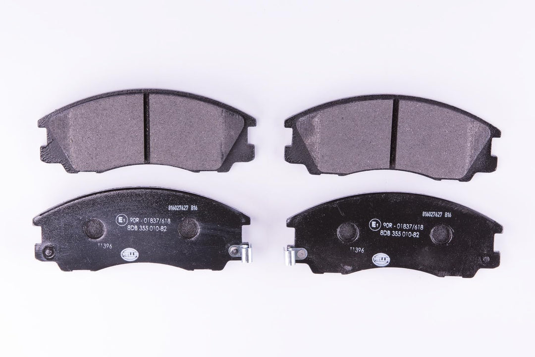 HELLA PAGID 8DB 355 010-821 Bremsbelagsatz - T1396 - Dicke/Stärke: 16.6mm - Bremssystem: Mando - mit