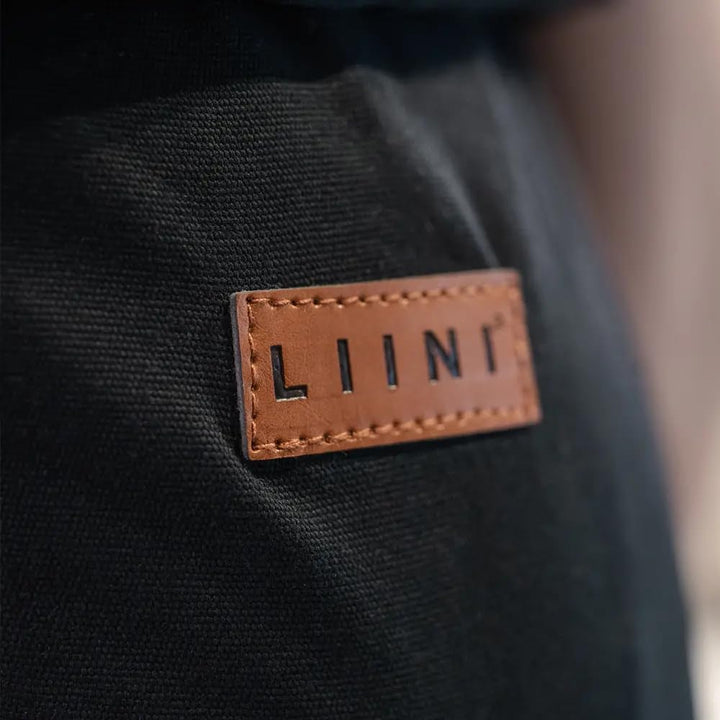 LIINI® Babytrage aus Baumwolle (Schwarz) – ab Geburt (3,5 kg) bis 15 kg, verstellbare Träger, Kopfst
