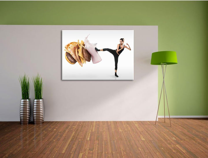 Pixxprint Frau kickt gegen Fastfood als Leinwandbild/Grösse: 100x70 cm/Wandbild/Kunstdruck/fertig be