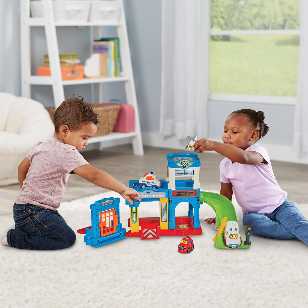 VTech Baby TUT TUT Baby Flitzer - Polizeiwache – Interaktives Spielset mit Polizeiauto, Musik, spann