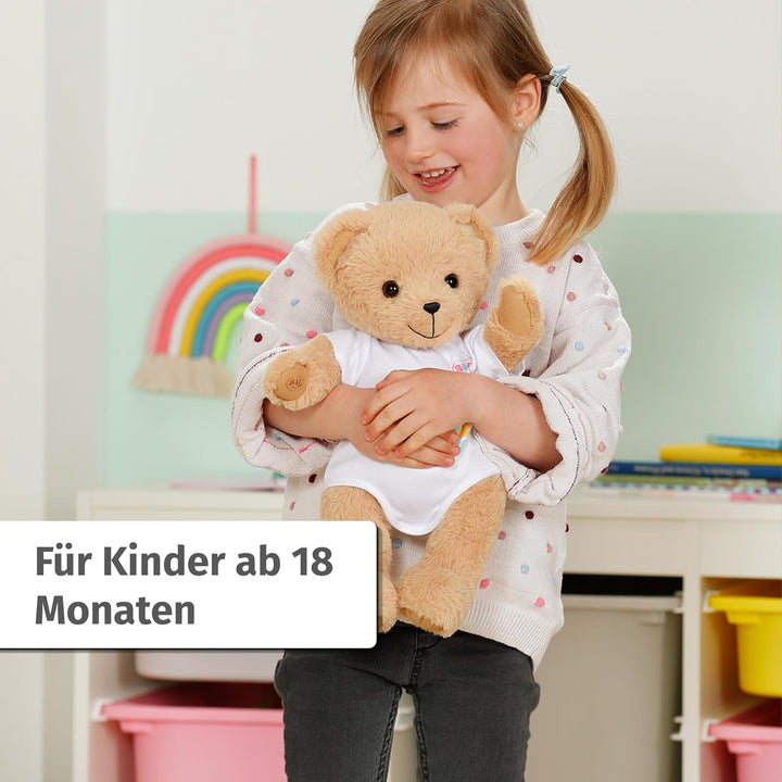 BABY born Singender Teddy, Plüschbär mit Soundfunktion, weissem Strampler und beweglichen Armen und