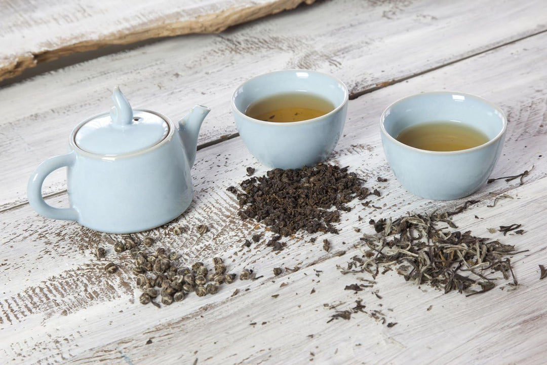 TEASOUL B6021249 Porzellan Teekanne mit 2 Tassen, 200 ml, blau