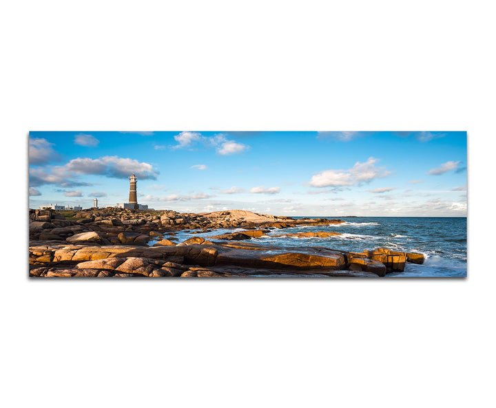 Paul Sinus Art Panoramabild auf Leinwand und Keilrahmen 150x50cm Uruguay Meer Küste Felsen Leuchttur