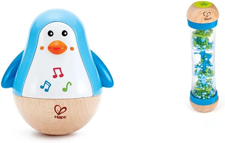 Hape Stehauf-Pinguin | Farbiger Stehauf-Pinguin mit Melodie, Stehauf-Spielzeug für Kinder im Alter v