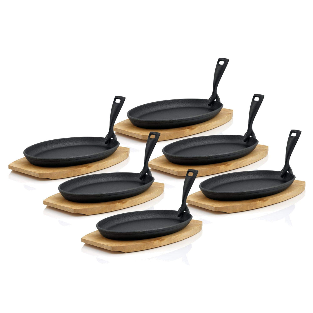 BBQ-Toro Gusseisen Servierpfännchen mit Holzunterlage (6 Stück) | 27 x 18 x 3 cm - oval | bereits ei
