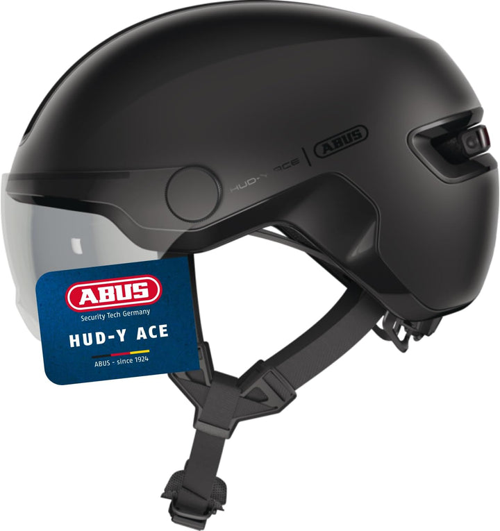 ABUS Stadthelm HUD-Y ACE - stylischer Fahrradhelm mit Visier und magnetischem, aufladbarem LED-Rückl