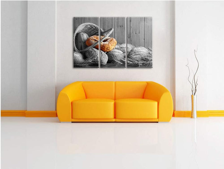 frisch gebackene Brötchen in geflochtenem Korb schwarz/weiss 3-Teiler Leinwandbild 120x80 Bild auf L