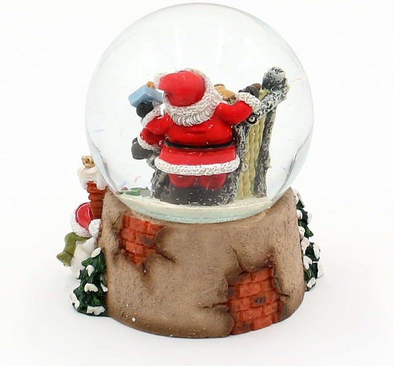 Schneekugel Rentier im Sessel und Weihnachtsmann, auf Kamin Sockel, L/B/H/Ø Kugel 8 x 7 x 8,8 cm Ø 6