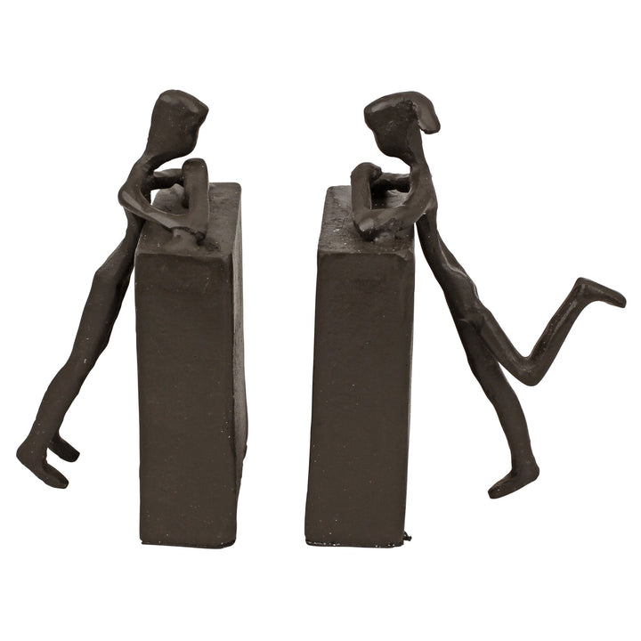 Design Toscano Über dem Buchregal, Figuren aus Eisenguss
