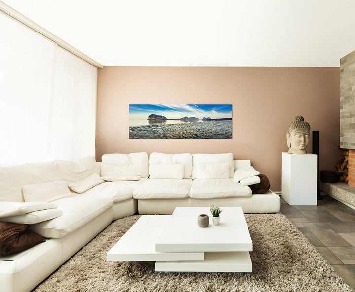 Paul Sinus Art Panoramabild auf Leinwand und Keilrahmen 150x50cm Strand Meer Felsen Wolkenschleier S