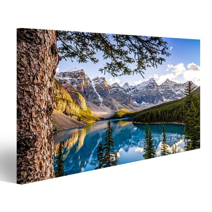 islandburner Bild auf Leinwand Landschaftsansicht des Morain Sees und des Gebirgszugs mit Baum im Vo