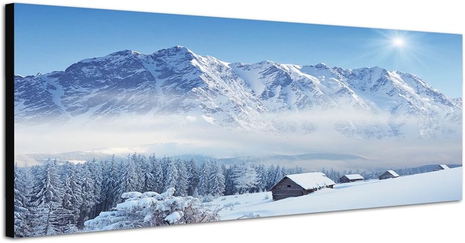 Paul Sinus Art Panoramabild auf Leinwand und Keilrahmen 150x50cm Winterlandschaft Berge Wald Häuser