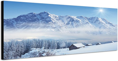 Paul Sinus Art Panoramabild auf Leinwand und Keilrahmen 150x50cm Winterlandschaft Berge Wald Häuser