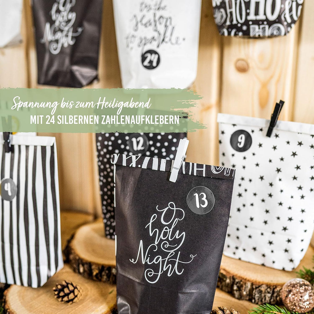 Papierdrachen Adventskalender zum Befüllen - 24 schwarze und weisse bedruckte Geschenktüten und 24 Z