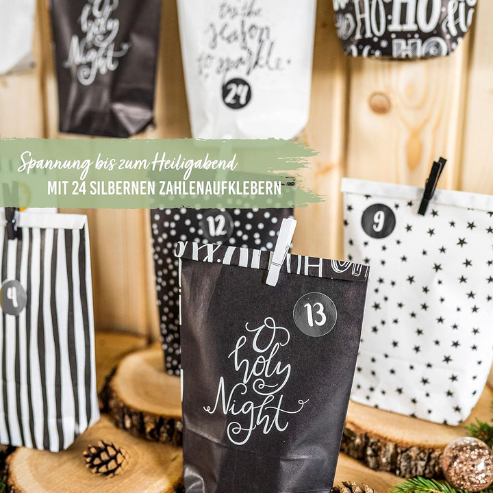 Papierdrachen Adventskalender zum Befüllen - 24 schwarze und weisse bedruckte Geschenktüten und 24 Z