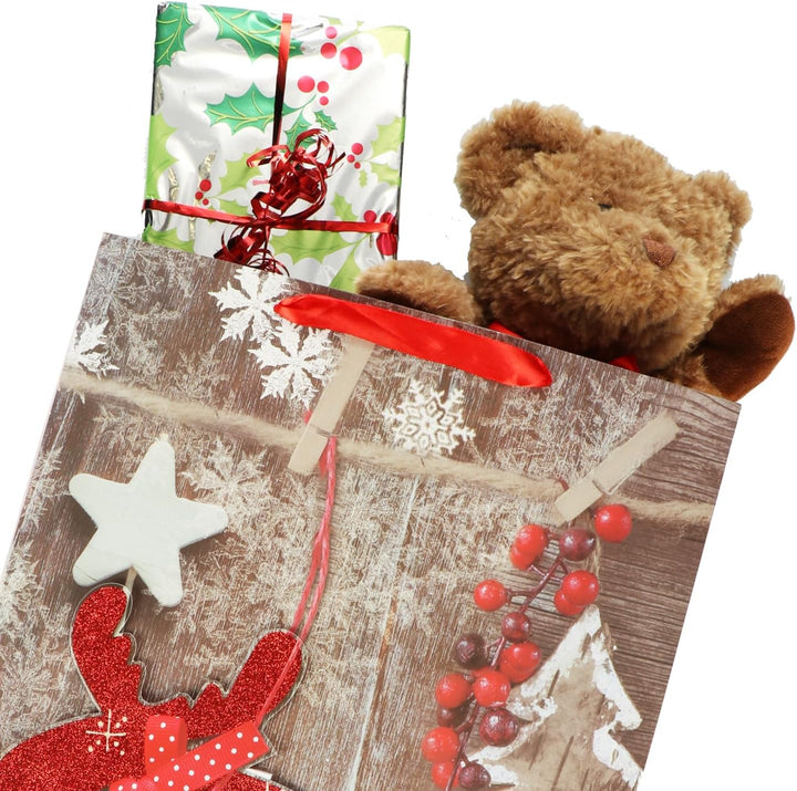 COM-FOUR® 12x XL Geschenktüte für Weihnachten, Nikolaus und Advent - Geschenktasche mit Weihnachtsmo