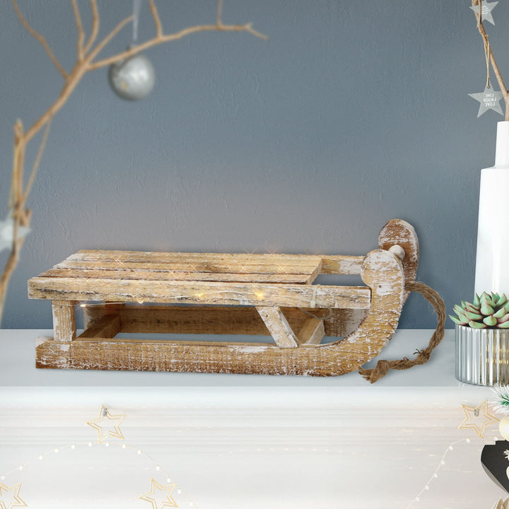 ECD Germany Deko Schlitten aus Holz mit 25 Warmweissen LEDs, 31,5x14,5x10,5 cm, Braun-Natur, Batterr