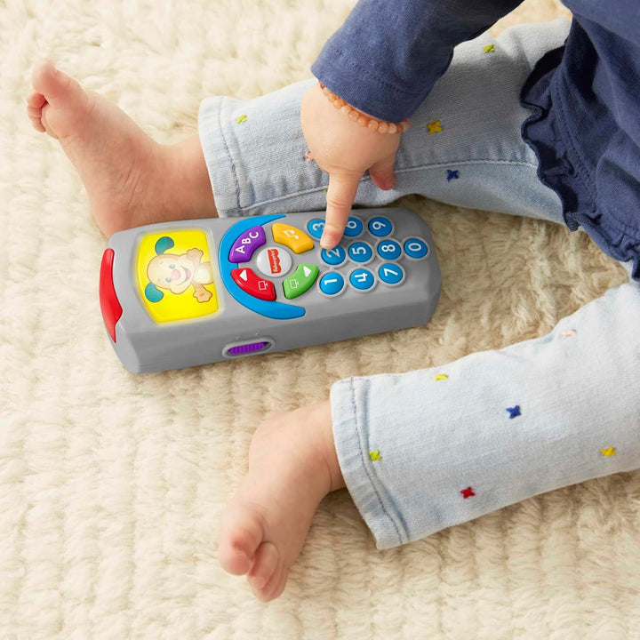 Fisher-Price Lernspass Lernspielzeug für Babys Hündchen-Fernbedienung Spielzeugfernbedienung mit Mus