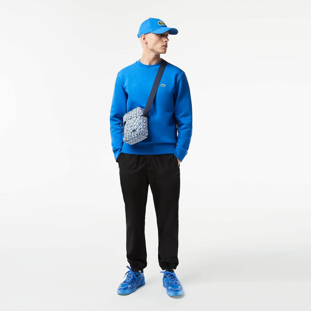 Lacoste Herren Umhängetasche VERTICAL CAMERA BAG,100% recyceltes Polyester Mono Grossbritannien, Wei