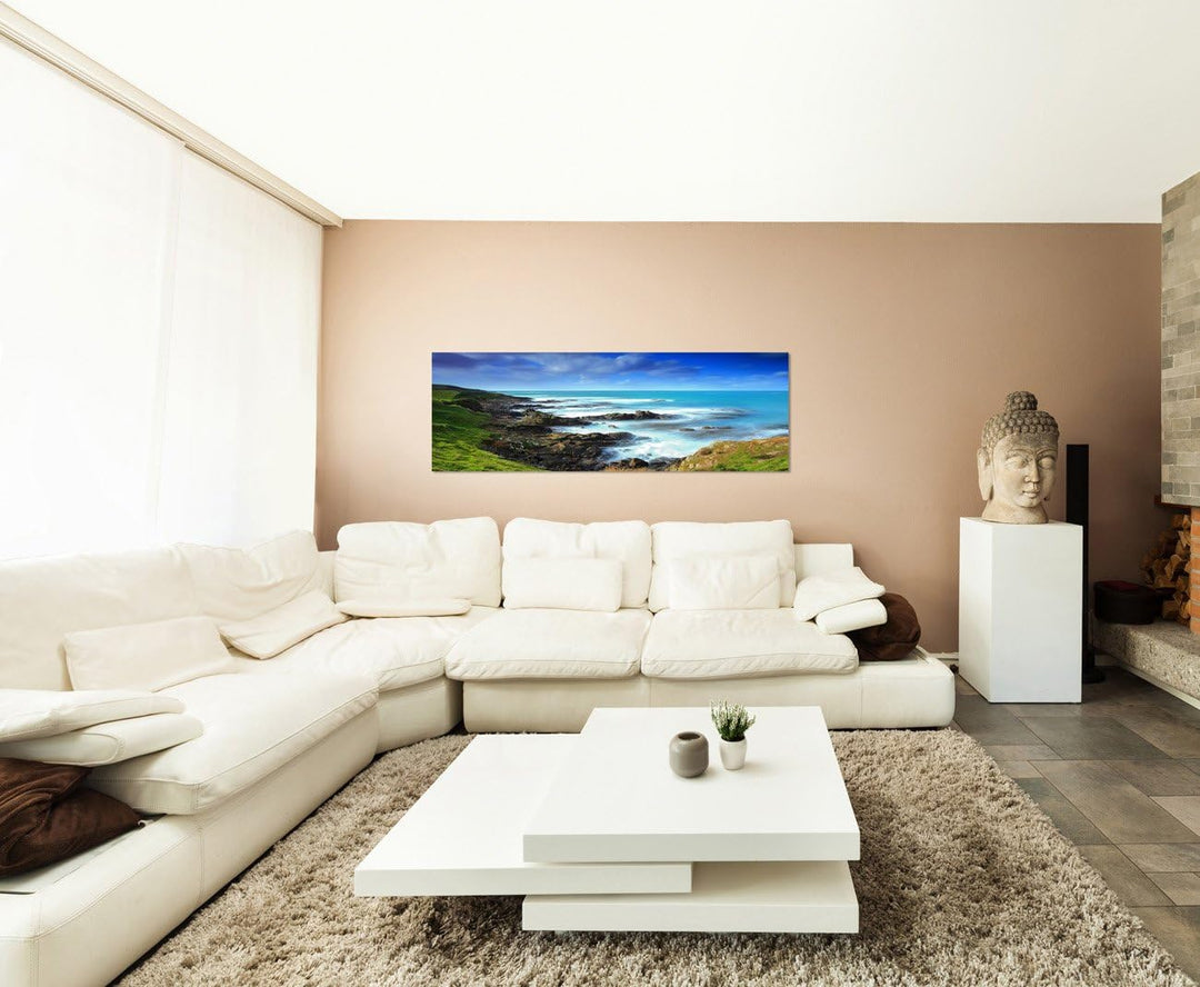 Paul Sinus Art Panoramabild auf Leinwand und Keilrahmen 150x50cm Neuseeland Küste Wiese Meer Wolken