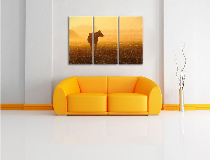 Pixxprint eine fressende Kuh auf der Weide als Leinwandbild/Grösse: 3 Teilig (120x80) / Wandbild/Kun