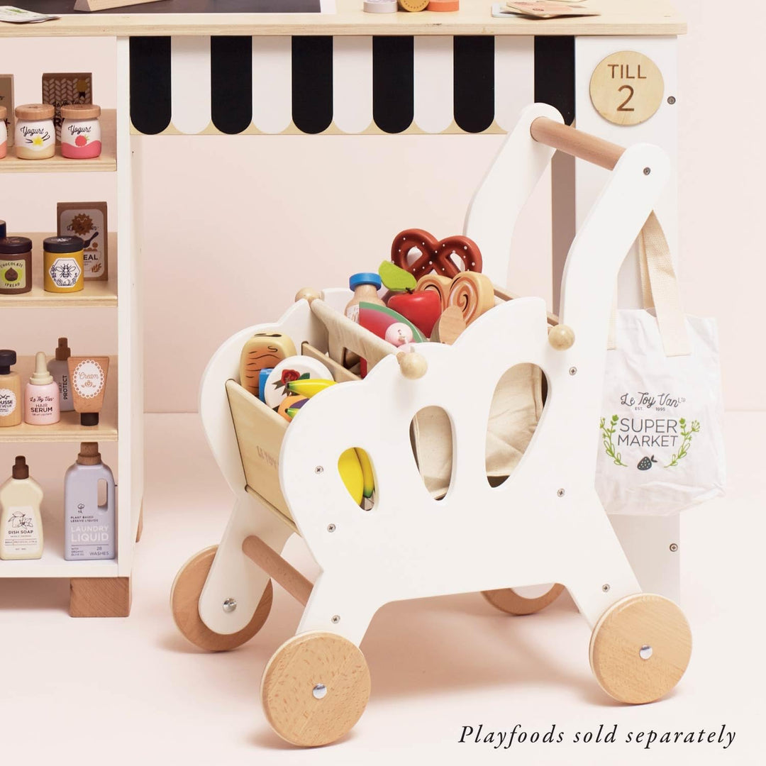 Le Toy Van – Honeybake Einkaufswagen aus Holz mit abnehmbarer Tasche | Supermarkt-Rollenspiel Lebens
