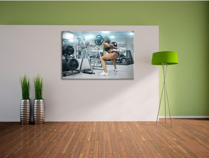 Pixxprint Sportliche Frau mit Hantelstange als Leinwandbild/Grösse: 100x70 / Wandbild/Kunstdruck/fer