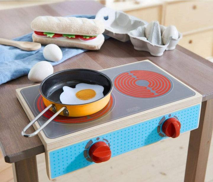 HABA 305132 - Kochstellen-Set Culina, mit 2 Herdplatten, 1 Pfanne und 1 Spiegelei, platzsparende Alt