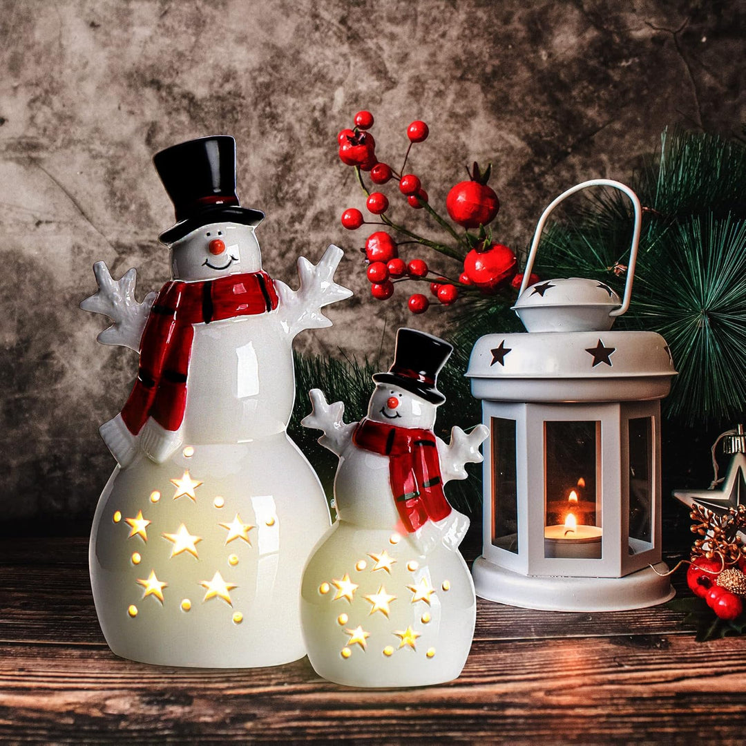 COM-FOUR® 2X LED Schneemann als dekorative Beleuchtung - Lichterstatue - Weihnachtsfigur aus Keramik