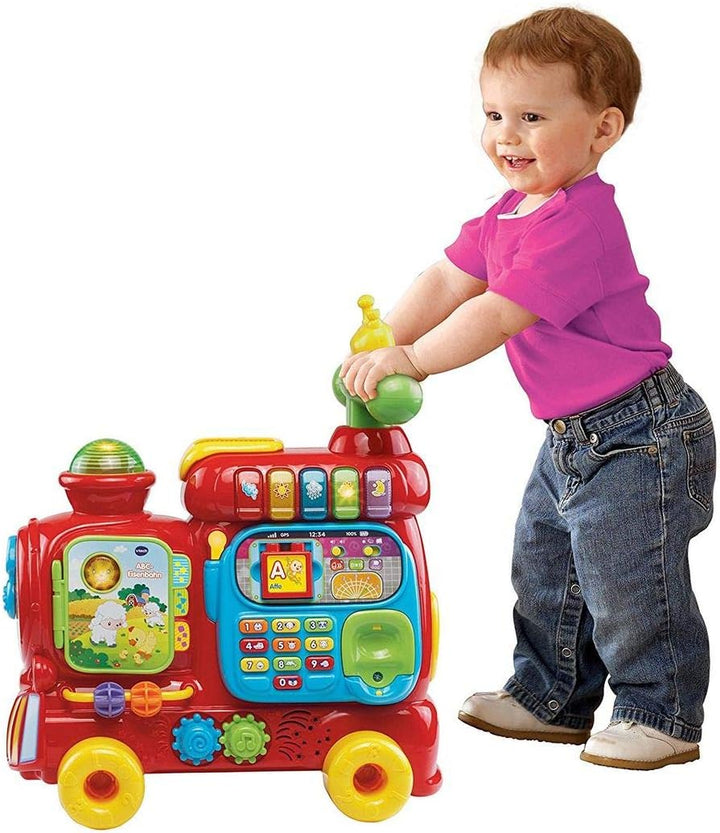 VTech Baby ABC-Eisenbahn – Rutschfahrzeug, Zieh- oder Laufwagen und Spielboard mit Zahlen, Buchstabe