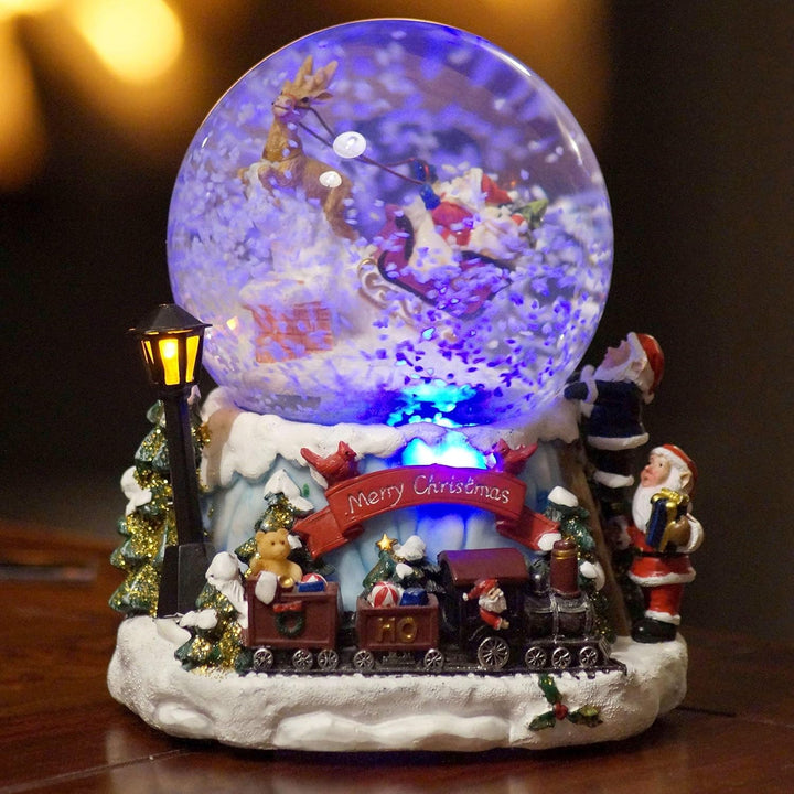 Wichtelstube-Kollektion XL LED Schneekugel Weihnachten elektrischer Schneewirbel, viele Melodien und