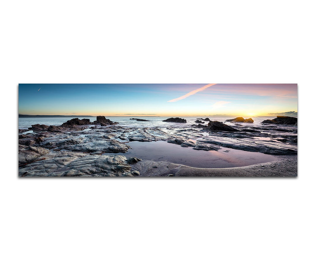 Paul Sinus Art Panoramabild auf Leinwand und Keilrahmen 150x50cm Cornwall Steinbecken Meer Sonnenunt