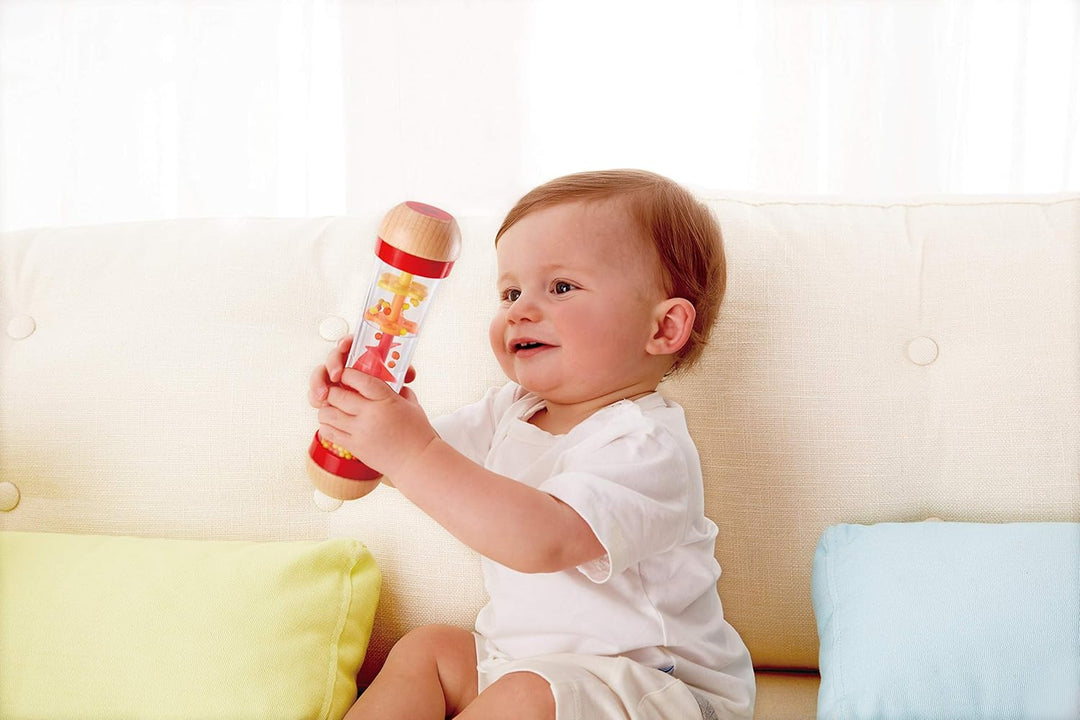 Hape E0331 - Stehauf-Pinguin, Stehaufmännchen mit Klang, blau, ab 6 Monaten & E0327 - Roter Regenmac